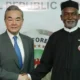 Chinese Foreign Minister Wang Yi (L) with Nigeria’s Foreign Affairs Minister Yusuf Tuggar (R) during Minister Wang’s diplomatic visit to Abuja on 9 January 2025. (Kola Sulaimon/AFP)