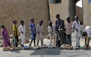 Boys play outside a bakery in Dapchi, in the northeastern state of Yobe, Nigeria March 22, 2018. REUTERS/Afolabi Sotunde/File Photo