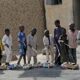 Boys play outside a bakery in Dapchi, in the northeastern state of Yobe, Nigeria March 22, 2018. REUTERS/Afolabi Sotunde/File Photo